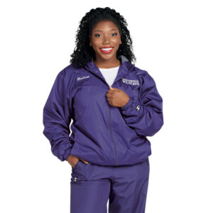 woman in a Champion Stadium Hooded Jacket with coordinating pants, front view