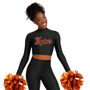 black dance basics crop top with and leggings with orange poms with a pretty smiling model, front detail