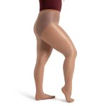 Model wearing suntan capezio ultra shimmery footed tight, side view