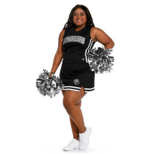 black cheer shell with black and white trim and decoration that reads "Pathers" with black cheer skirt with black and white trim and a panthers mascot, front view with smiling pretty model