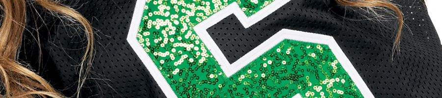 shirt applique detail with green sequins