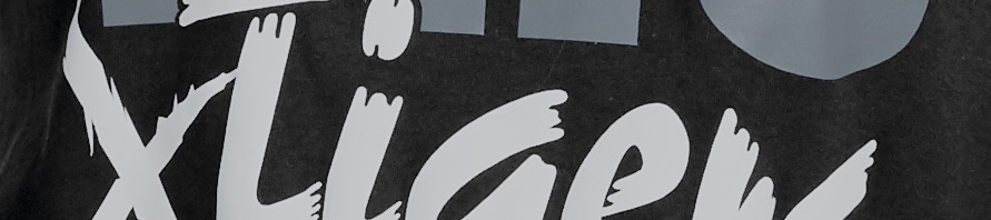 grey and white vinyl heat transfer on a black shirt