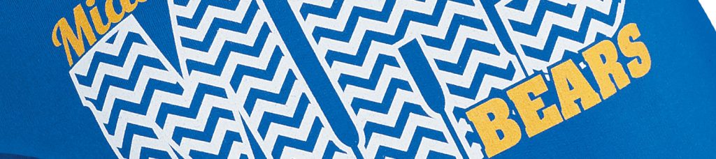 screen print detail in white and gold on a blue shirt