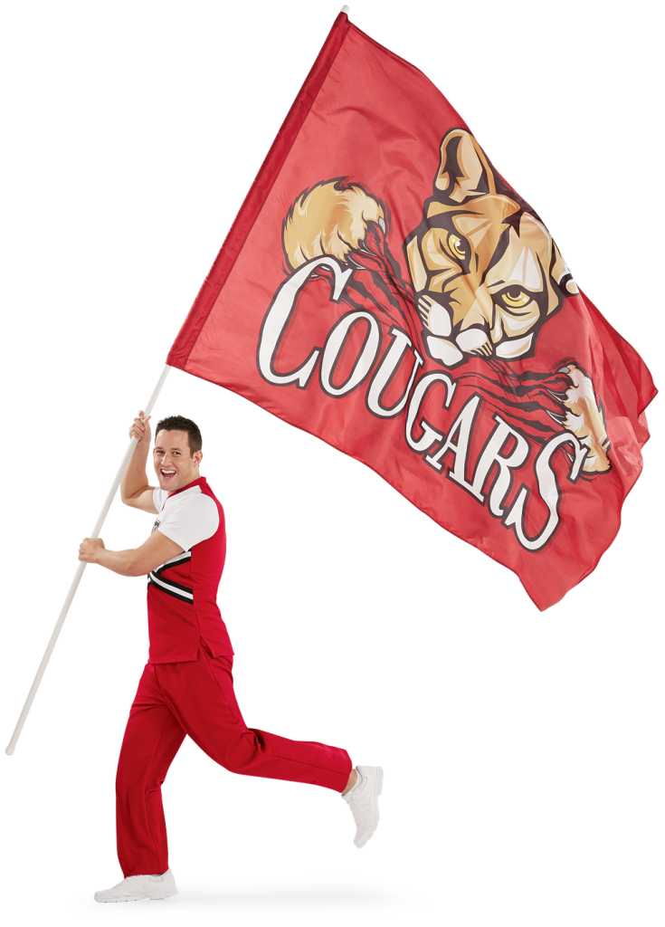 Male cheerleader holding a large spirit flag.